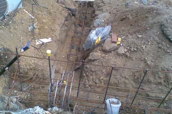 Trenches with reinforcement for strip footing